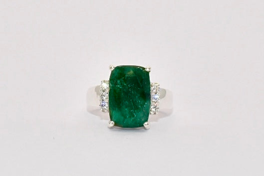 Premium Grade natural Emerald ring with a deep forest green colour, set in 925 silver.
