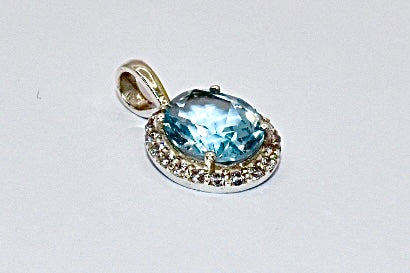 Premium Grade natural Aquamarine and CZ  pendant with a delicate tropical blue colour, set in 925 silver.