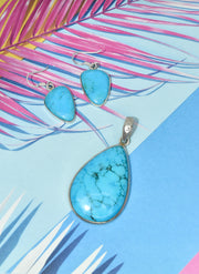 Turquoise Ring with Silver Side Detail