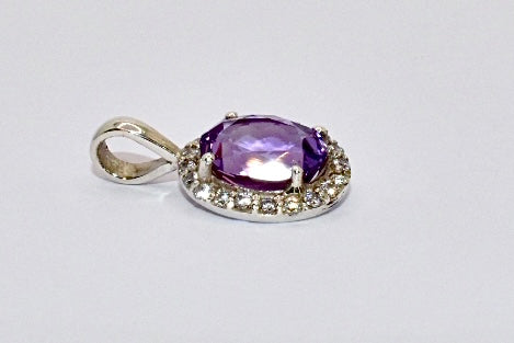 Premium Grade natural Amethyst and CZ pendant with a vibrant purple colour, set in 925 silver.