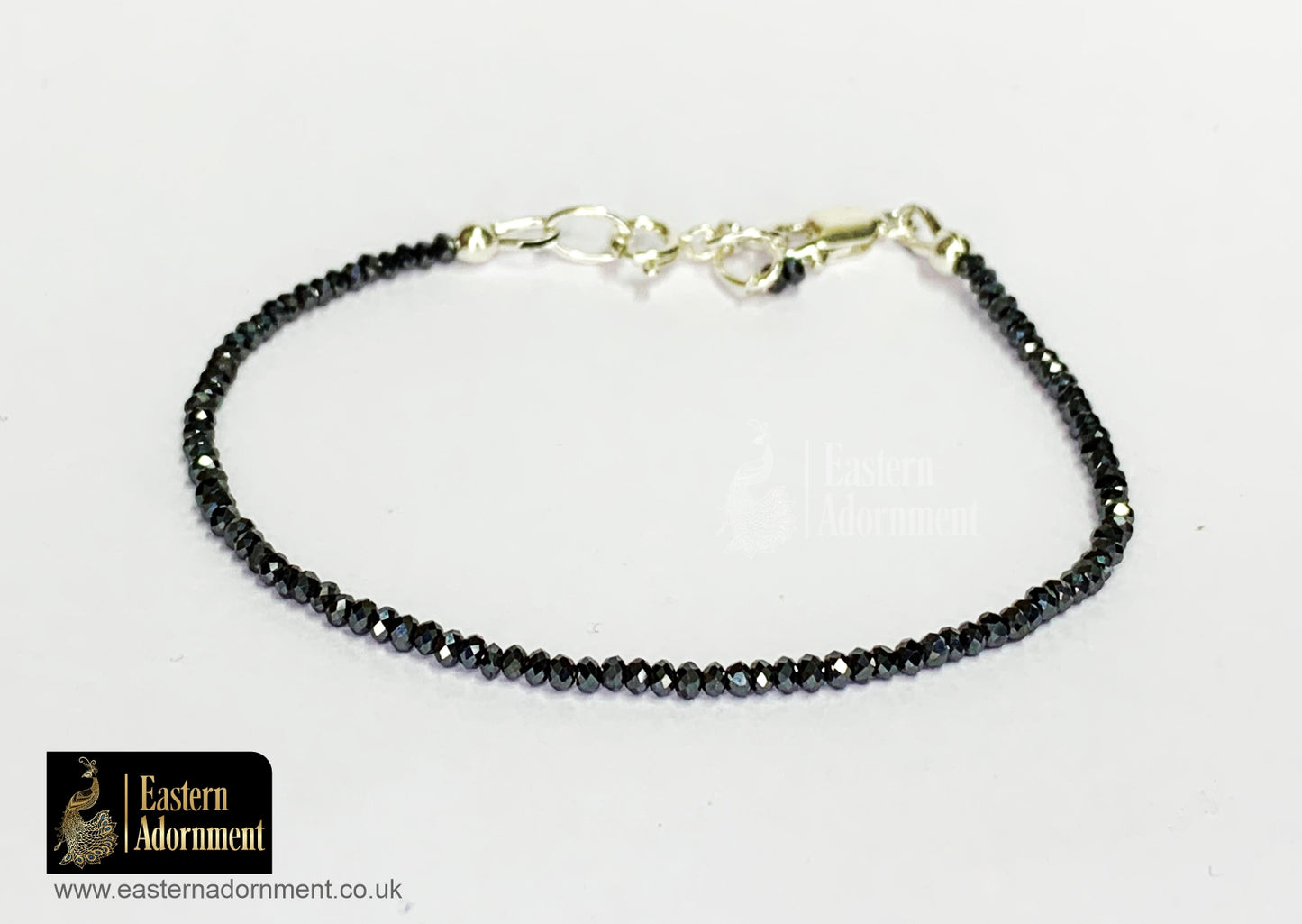 Hematite Micro Cut Bead Bracelet with Silver Charm Clasp