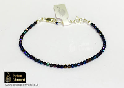 Titanium Quartz Micro Cut Bead Bracelet with Silver Charm Clasp
