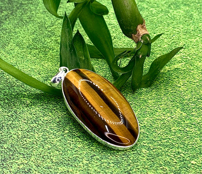 Golden Tiger’s Eye large oval pendant  set in 925 silver